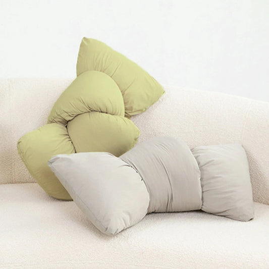 リボン型クッションの全体像。8色のカラーバリエーションがあり、ソファやベッドを飾る韓国インテリア風の装飾用クッション。